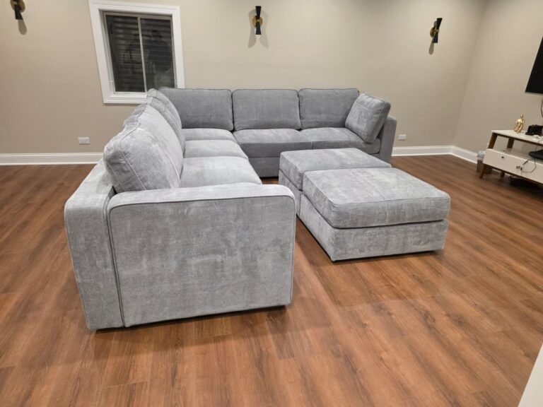 Finished L-shaped Lovesac Sactional with two ottomans, seen from the side