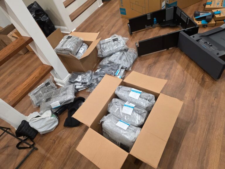 Lovesac covers and parts unboxed and sorted on the floor